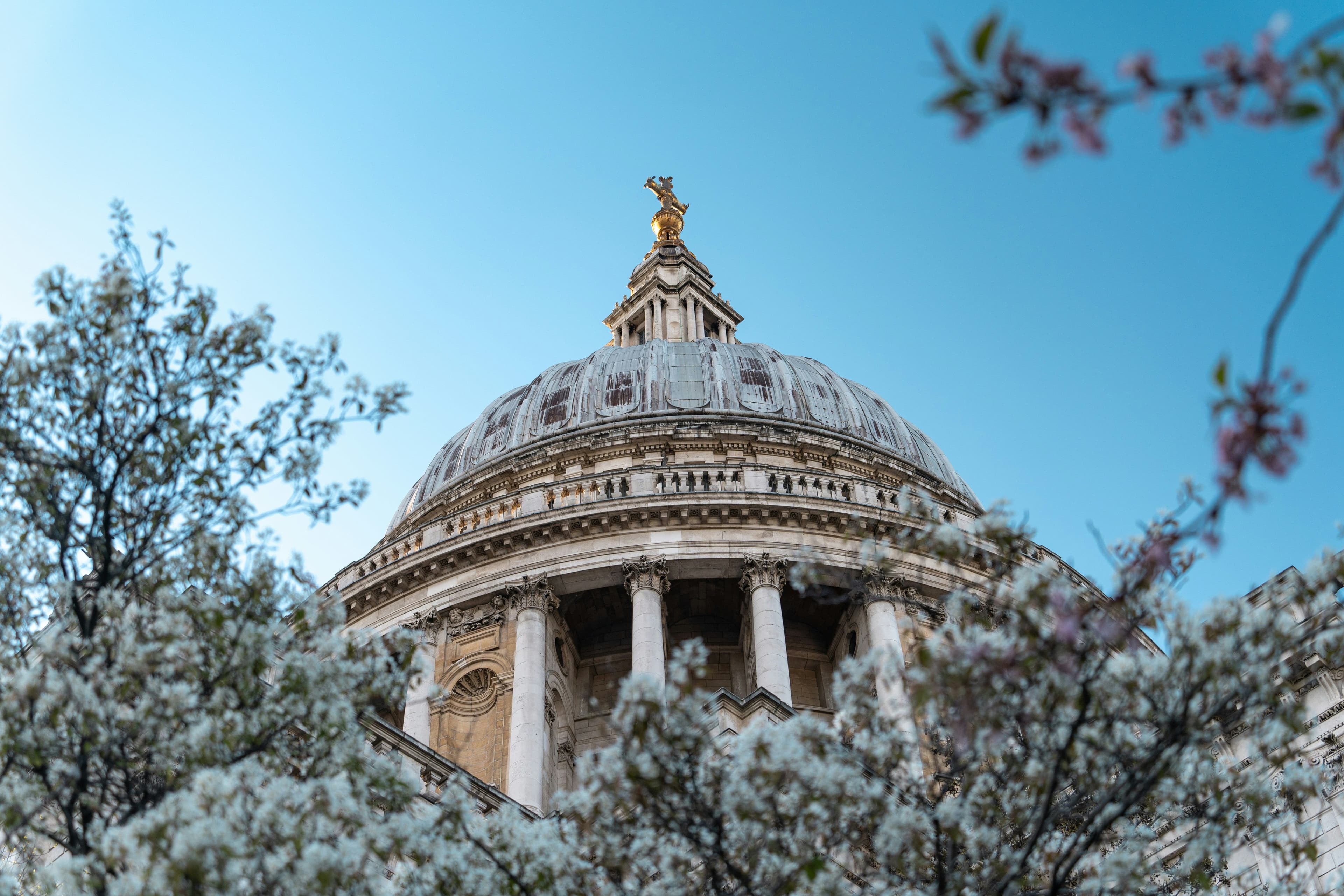 Flowers surrounding a monument in England