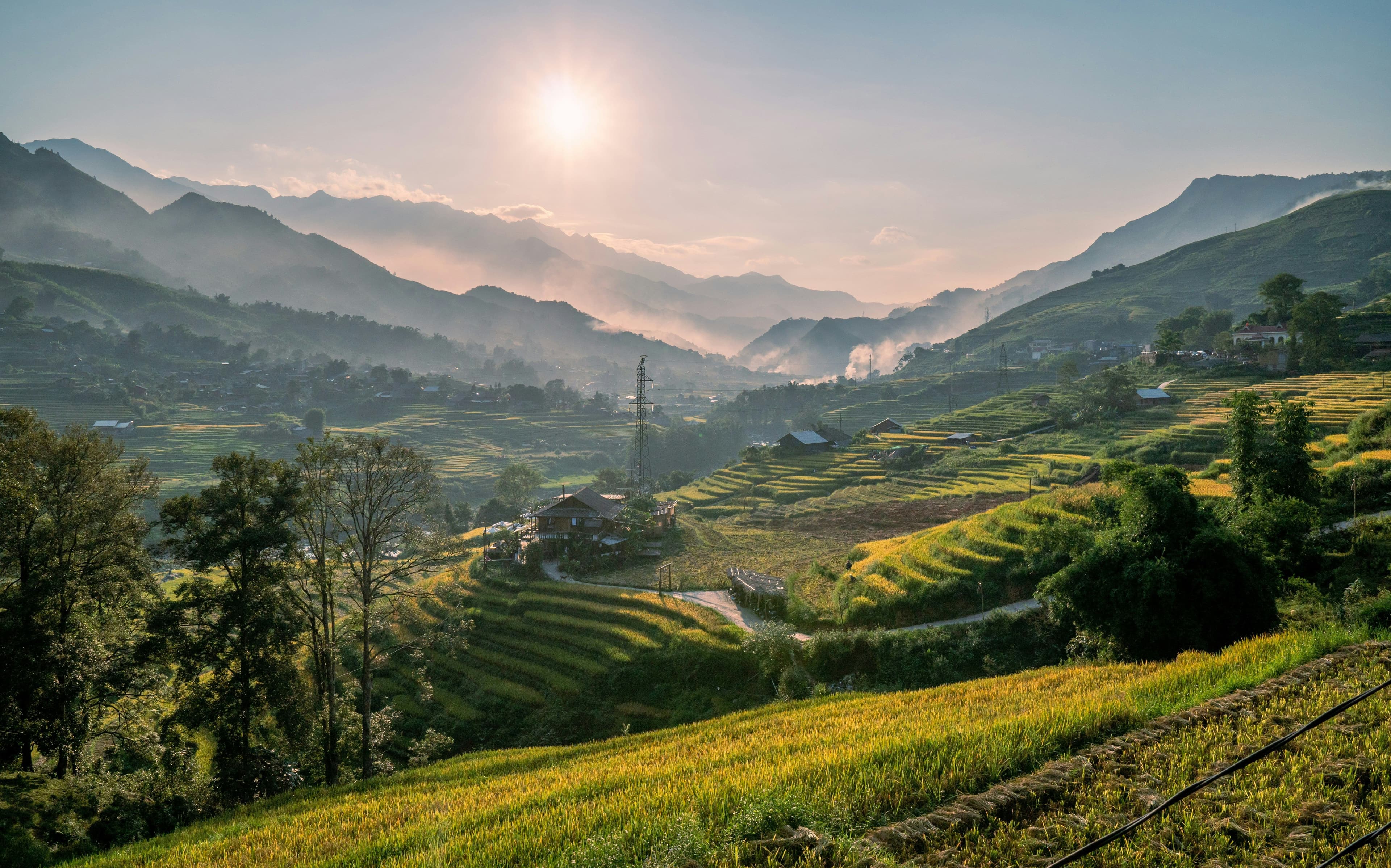 Sunset at Sapa in the mist in mountains with rice fields
